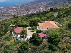 an aerial view of a house on a hill at Apartment Mariposa Azul in Icod de los Vinos