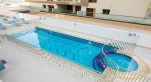 Bazén v ubytování Rose Executive Hotel - DWTC nebo v jeho okolí + 37 fotografií