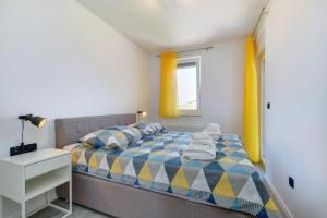 Кровать или кровати в номере Apartments Hemetek