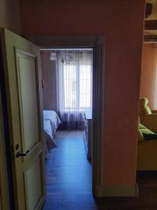 Postel nebo postele na pokoji v ubytování Vana Kasiino Apartement