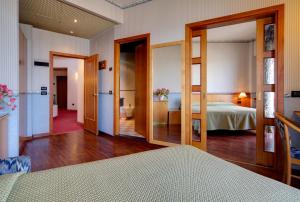 Кровать или кровати в номере Hotel Palace