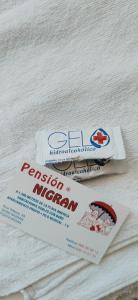 a package of fixation mop on a white mattress at Pensión Nigrán in Nigrán +48 photos