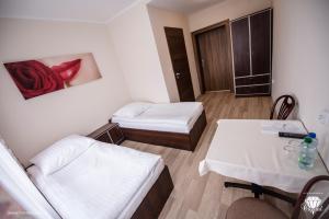 Posteľ alebo postele v izbe v ubytovaní Hotel Crystal