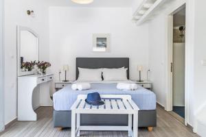 Кровать или кровати в номере Milia Beach Apartments