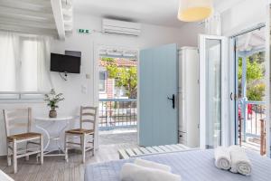 Кровать или кровати в номере Milia Beach Apartments