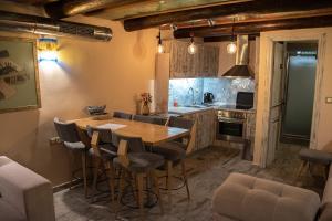 Kuchyň nebo kuchyňský kout v ubytování Odos Oneiron Boutique Hotel