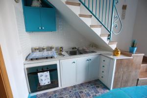 A kitchen or kitchenette at Casa Gilda