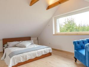 Łóżko lub łóżka w pokoju w obiekcie Domek Kaszuby Sominy Luxhut