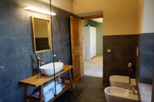 Koupelna v ubytování Agriturismo Cheloni