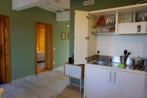 Kuchyň nebo kuchyňský kout v ubytování Agriturismo Cheloni