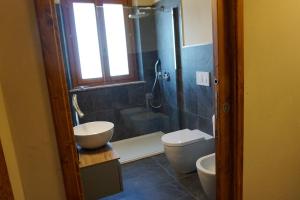 Koupelna v ubytování Agriturismo Cheloni