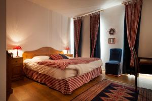 Postel nebo postele na pokoji v ubytování Auberge Saint Laurent