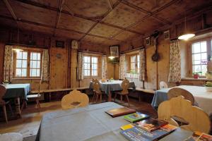 Reštaurácia alebo iné gastronomické zariadenie v ubytovaní THOMASERHOF