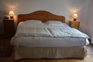 Postel nebo postele na pokoji v ubytování Auberge Saint Laurent