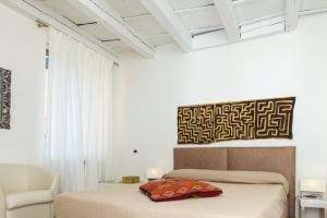Posteľ alebo postele v izbe v ubytovaní Corte Quaranta