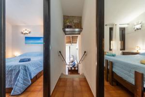 Кровать или кровати в номере Villa Laura