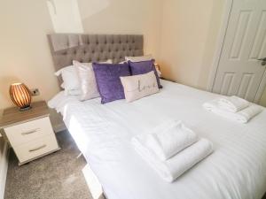 Postel nebo postele na pokoji v ubytování Eden Lodge - Sherwood 21