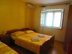 Łóżko lub łóżka w pokoju w obiekcie Apartment Przina 856-2