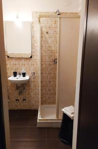 a bathroom with a shower and a sink at Cà Tron Apartment next to Rialto bridge in Venice