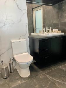 Kúpeľňa v ubytovaní MAGNIT Apartments у самого моря