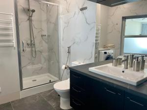Kúpeľňa v ubytovaní MAGNIT Apartments у самого моря