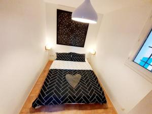 Cama o camas de una habitación en Le Jardin des Alpilles