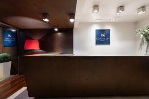 an office with a reception desk with a red lamp at Eurostars Marqués de Vallejo in Logroño