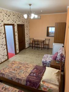 Cama o camas de una habitación en YugRa Guest House