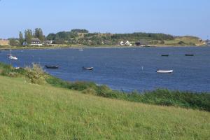 a large body of water with boats in it at Ferienhaus Boddenhus in Middelhagen