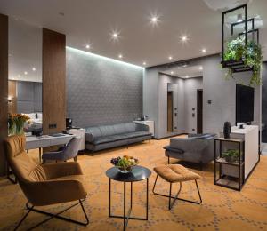 Posezení v ubytování Hotel Raymond
