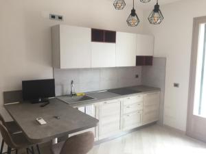 Kuchyňa alebo kuchynka v ubytovaní Residence B&B il Connubio