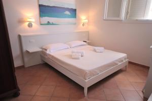 Cama o camas de una habitación en Solaris Guesthouse