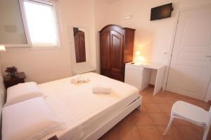 Cama o camas de una habitación en Solaris Guesthouse