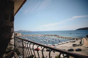a view of a marina with boats in the water at Best Western Plus La Corniche in Toulon