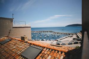 a view of a marina with boats in the water at Best Western Plus La Corniche in Toulon