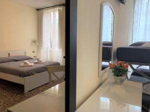 Postel nebo postele na pokoji v ubytování Hotel Baia di Levanto