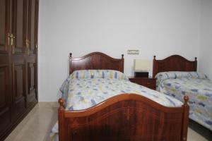 Posteľ alebo postele v izbe v ubytovaní LA CASA DEL ESTANCO