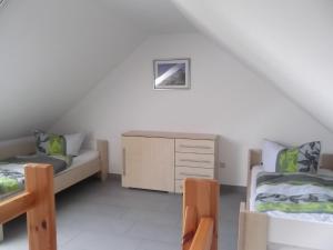 Postel nebo postele na pokoji v ubytování Appartementhaus Zur Schaabe