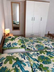Posteľ alebo postele v izbe v ubytovaní Dalmatia Apartments