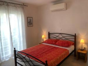 Posteľ alebo postele v izbe v ubytovaní Dalmatia Apartments