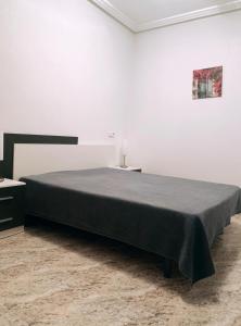Posteľ alebo postele v izbe v ubytovaní Apartamento Lola