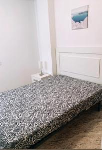 Posteľ alebo postele v izbe v ubytovaní Apartamento Lola + 9 fotografií