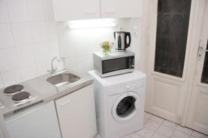 Kuchnia lub aneks kuchenny w obiekcie Raisa Apartments Lerchenfelder Gürtel 30