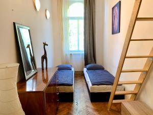 Łóżko lub łóżka w pokoju w obiekcie Raisa Apartments Lerchenfelder Gürtel 30