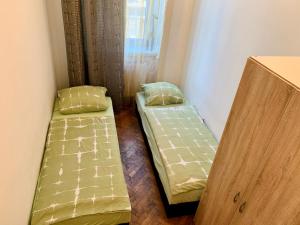 Łóżko lub łóżka w pokoju w obiekcie Raisa Apartments Lerchenfelder Gürtel 30