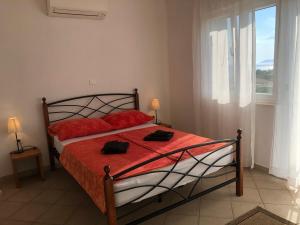 Posteľ alebo postele v izbe v ubytovaní Dalmatia Apartments