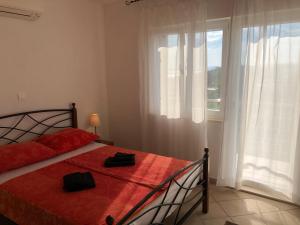 Posteľ alebo postele v izbe v ubytovaní Dalmatia Apartments