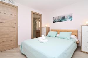 Posteľ alebo postele v izbe v ubytovaní Don Miguel 2-A Apartment Levante Beach + 33 fotografií