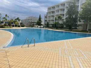 a large swimming pool in front of a building at Day Dream in Burgas