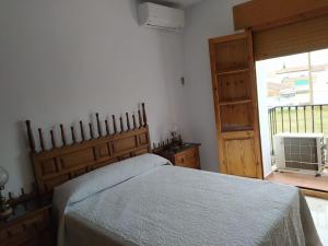 Ένα ή περισσότερα κρεβάτια σε δωμάτιο στο Casa Montilla